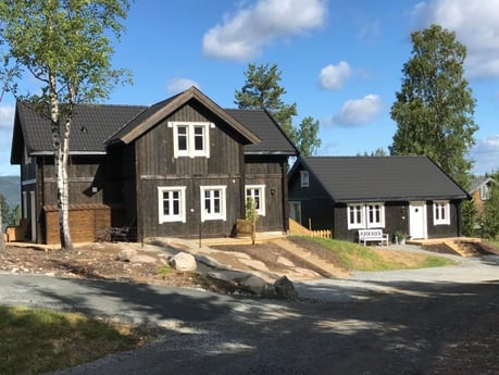 View of the property with guesthouse and cabin.