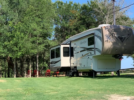 The travel trailer can be rented for extra guests.